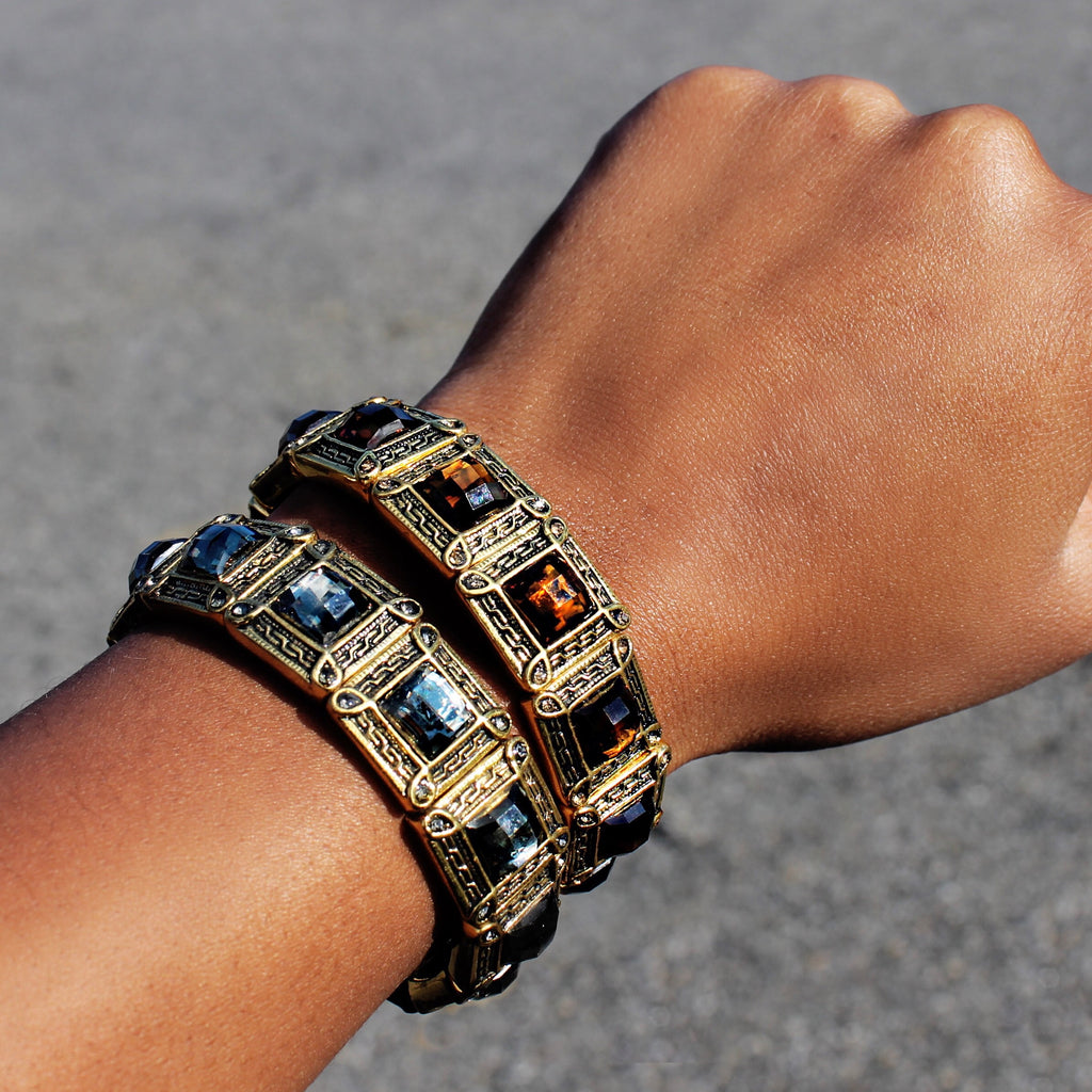  Antique Inspired Stretch Bracelets Featuring A Colored Gem.
